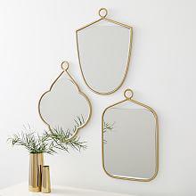آینه دکوراتیو با قاب طلایی