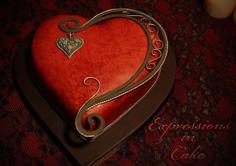 کیک تولد دخترانه قرمز فانتزی با تزئین شکلات و طرح خاص