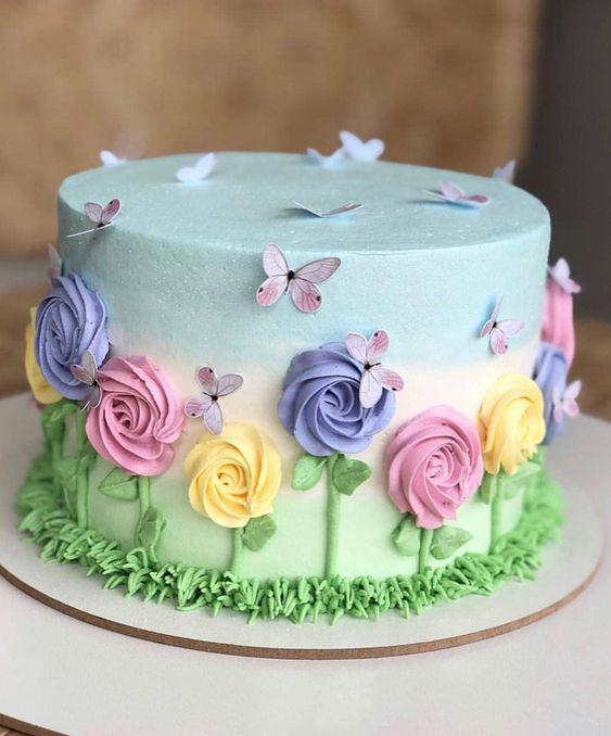 کیک تولد دخترانه گل با خامه های رنگی شاد|لیدی