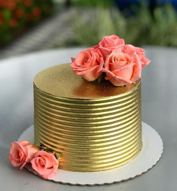کیک تولد دخترانه طلایی با تزئین رز صورتی|لیدی