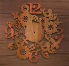ساعت دیواری چوبی دست ساز طرح گل و پرنده ا Handmade wooden wall clock with flower and bird design