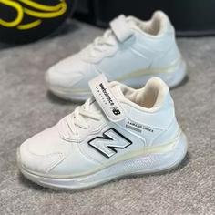 کفش کتونی اسپرت بچه گانه نیوبالانس (NewBalance) کپسولی رنگ سفید دخترانه وپسرانه