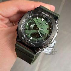 ساعت  مچی جی شاک GA2100 قاب فلزی سبز (جیشاک GShock) تنظیم اتوماتیک با پایتخت کشورها ،اتولایت اتوماتیک