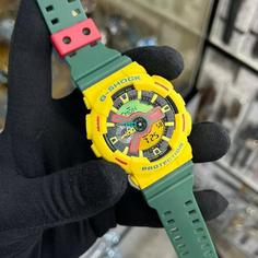 ساعت  مچی جی شاک GA110 جاماییکا سبز زرد   جیشاک GShock    صد در صد ضدآب   تنظیم اتوماتیک با پایتخت کشورها   اتولایت دار