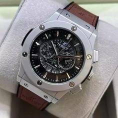 ساعت مچی مردانه هابلوت تقویم نمایان طرح کرنو موتور شرکتی  HUBLOT