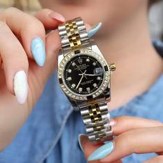 ساعت مچی زنانه مردانه بند استیل قاب نگینی یاقوتی رولکس Rolex