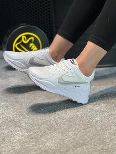 کفش کتونی اسپرت نایک (Nike) ایلیا زنانه و دخترانه رنگ سفید طوسی