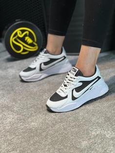 کفش کتونی اسپرت نایک (Nike) ایلیا زنانه و دخترانه رنگ سفید مشکی