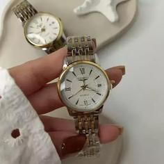 ست زنانه مردانه ساعت مچی بند استیل شیک و جذاب .longines. 