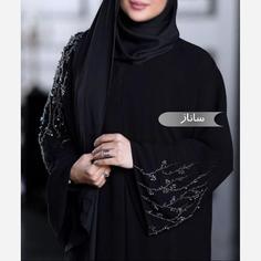 مانتو عبا ساناز جنس ابر و بادی (قیمت رنگ مشکی) (اقساط یکساله و کوتاه مدت) .