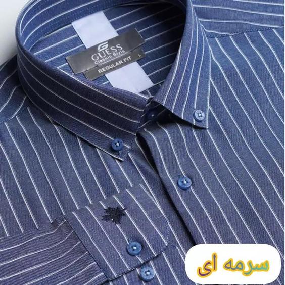 پیراهن مردانه GUESS کد 379 سرمه ای  یقه دکمه دار آستین بلند پارچه ترک دوخت صنعتی تک جیب پارچه بسیار خوش اتو ضد چرو|باسلام