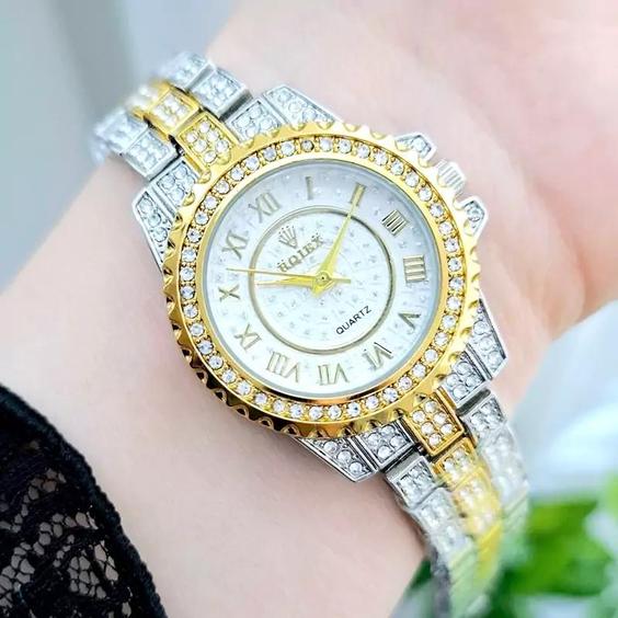 ساعت مچی زنانه فول نگین ROLEX رولکس بند استیل طلایی دو رنگ صفحه نمایش گرد سفید مجلسی شیک و جدید کد 3156|باسلام