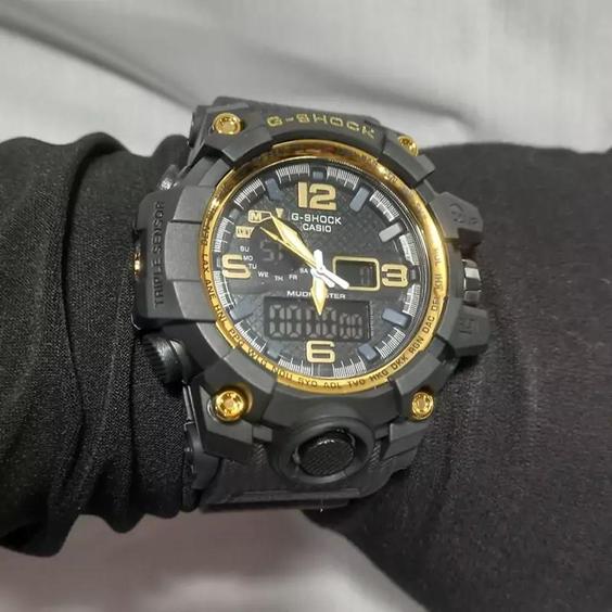 ساعت مچی دیجیتال عقربه ای جی شاک مشکی دور قاب طلایی G-SHOCK|باسلام (زنجیره ای تابنده)